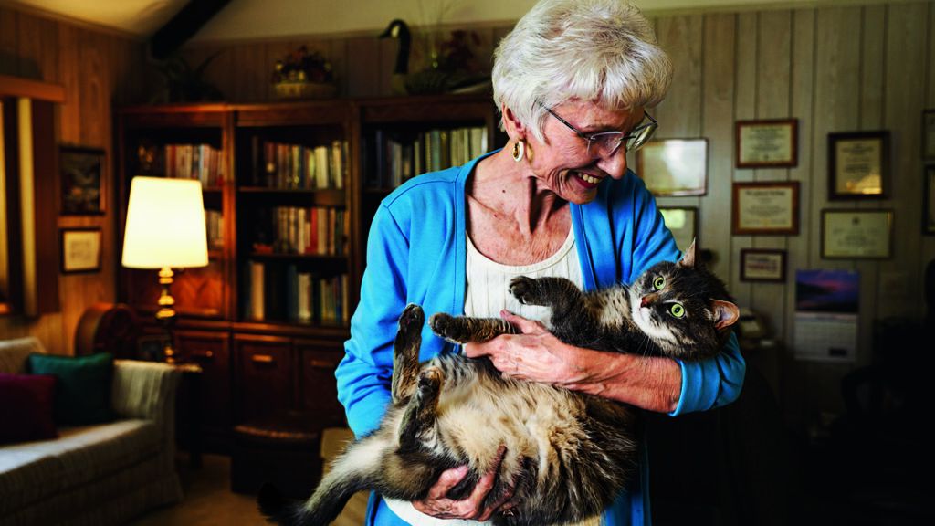 Carol and her favorite feline, Luna, whom she adopted from a shelter.