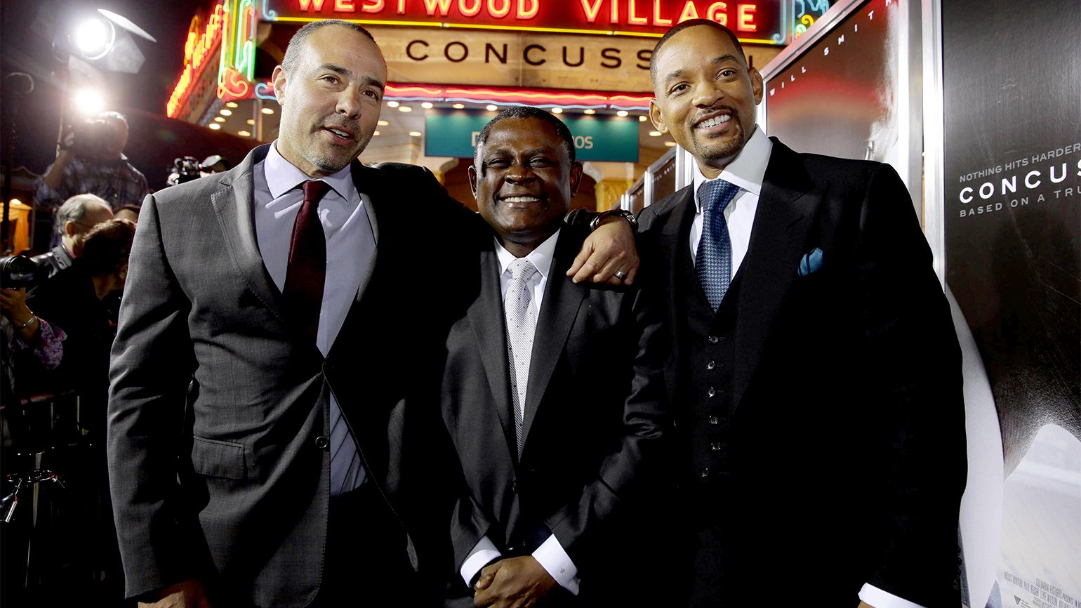 Director/writer Peter Landesman, Dr. Bennet Omalu and Will Smith at a screening of 'Concussion' in Los Angeles