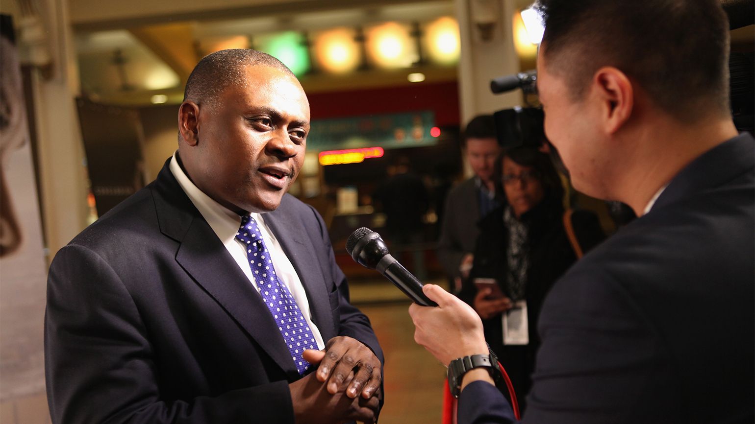 Dr. Bennet Omalu answers questions from the press