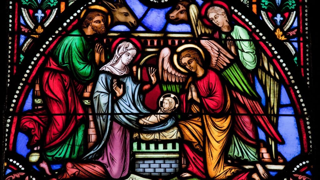 The Nativity scene rendered in stained glass