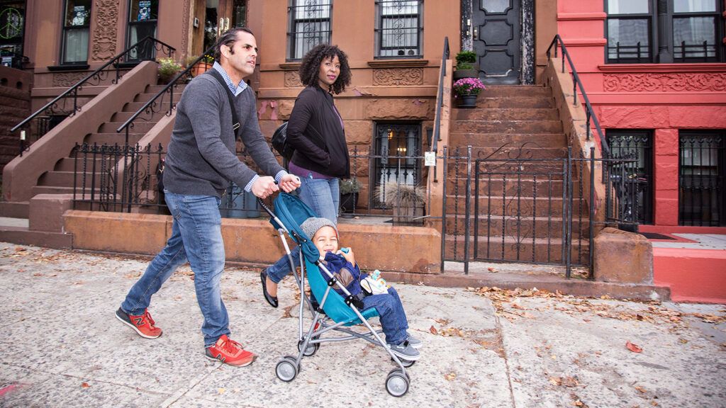 Brian, Angie and Gabriel out for a stroll in their Brooklyn neighborhood