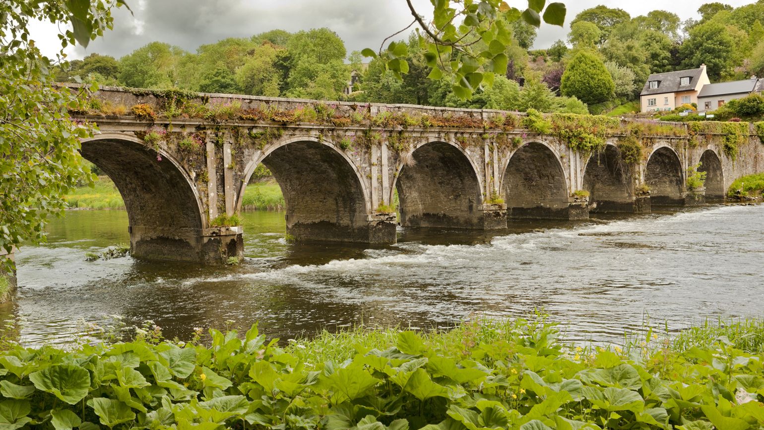 Water flowing under the medieval Irish bridge