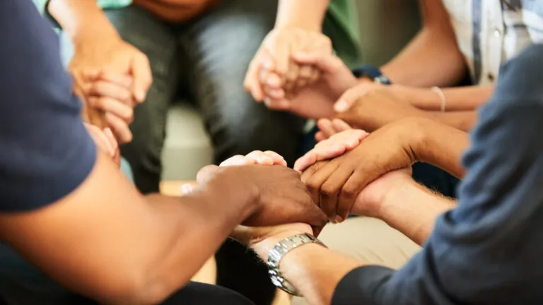 A group of people doing a lent prayer program together