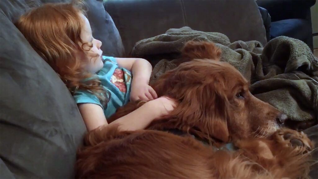 Peggy's granddaughter Grace with her dog, Ernest