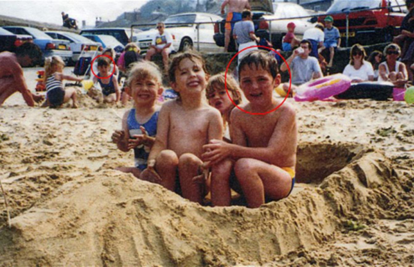 A picture of a Cornwall beach with young Aimee and Nick circled in red