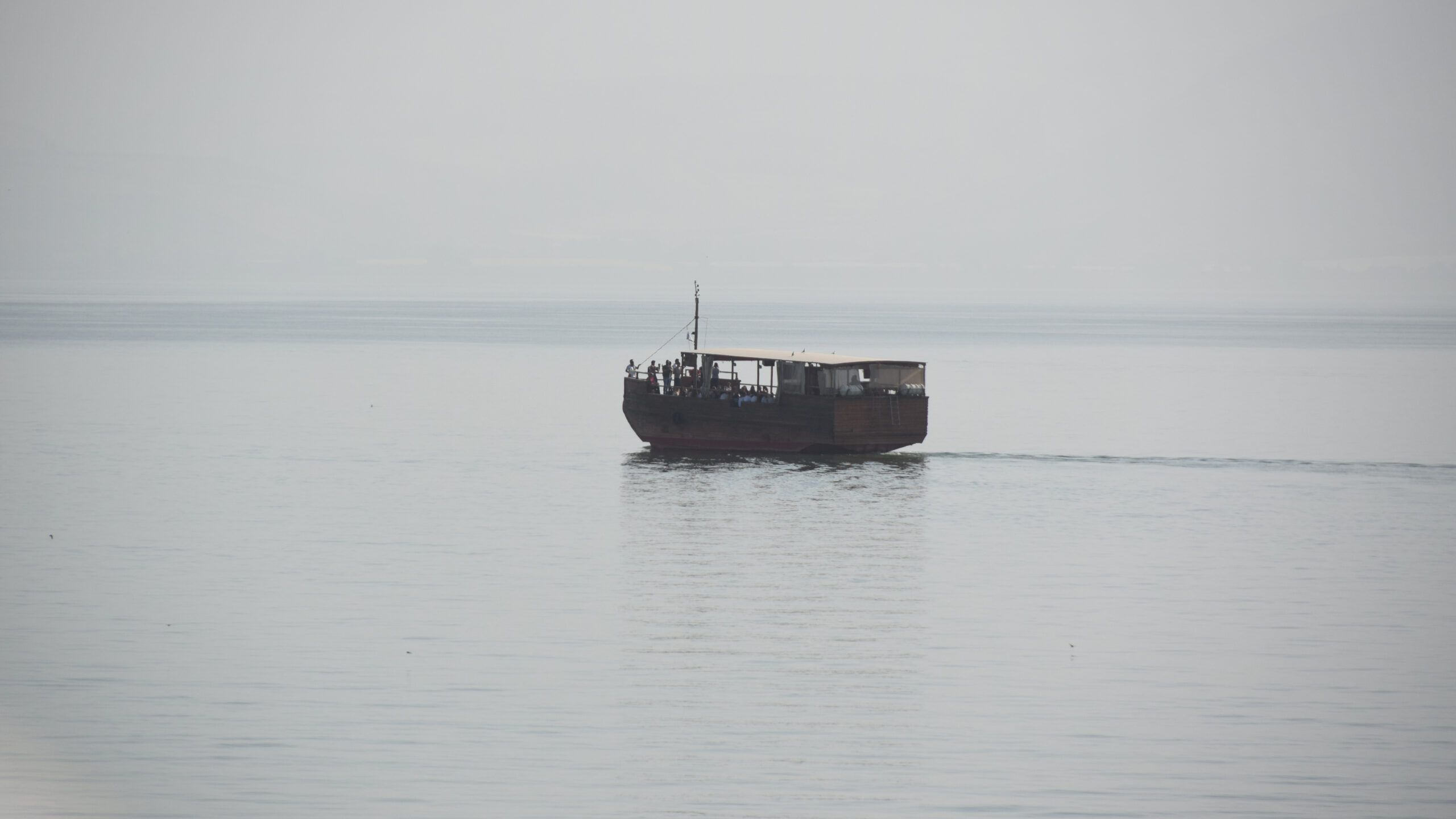 replica boat on the sea of galilee
