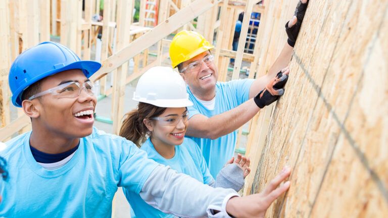 Volunteers build a home for the less fortunate