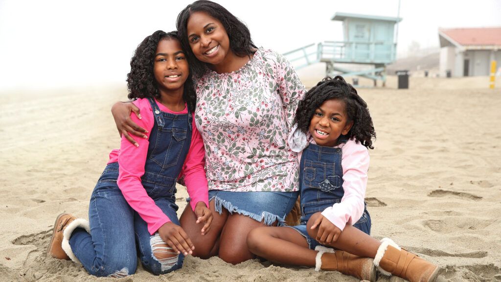 Phnesha with her daughters, Gabby (left) and Gigi