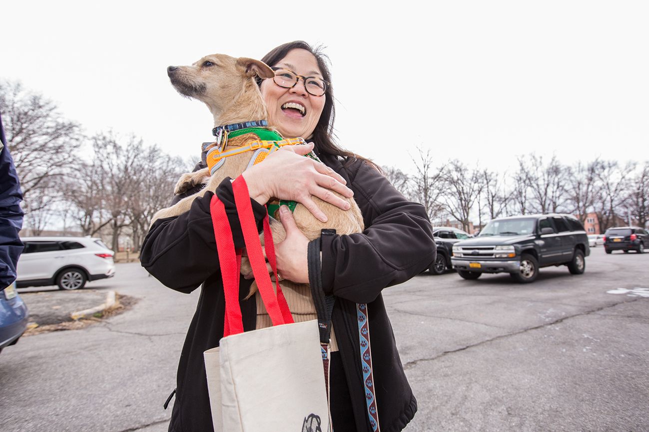 This adopter is ready to go home with her sweet rescue.