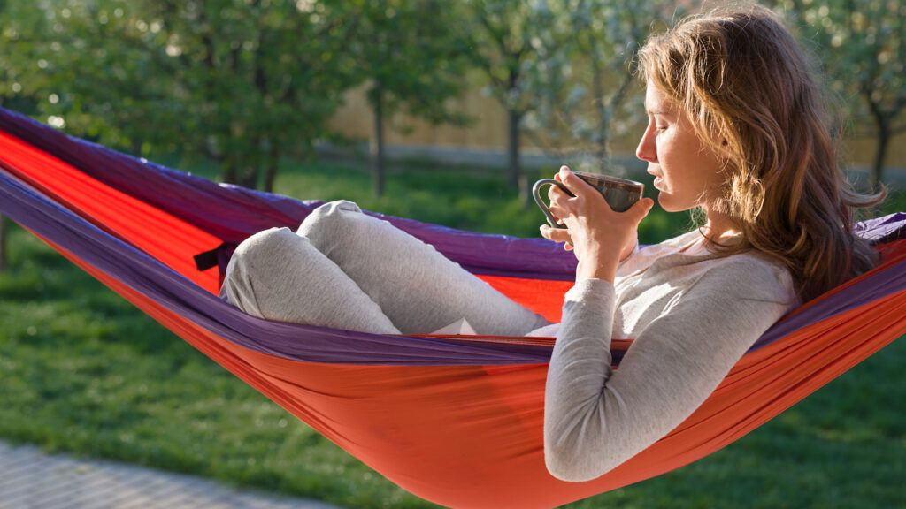 Woman resting in a hammock