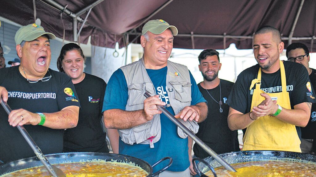 José (in blue shirt and vest) and fellow chef volunteers in Puerto Rico making sancocho
