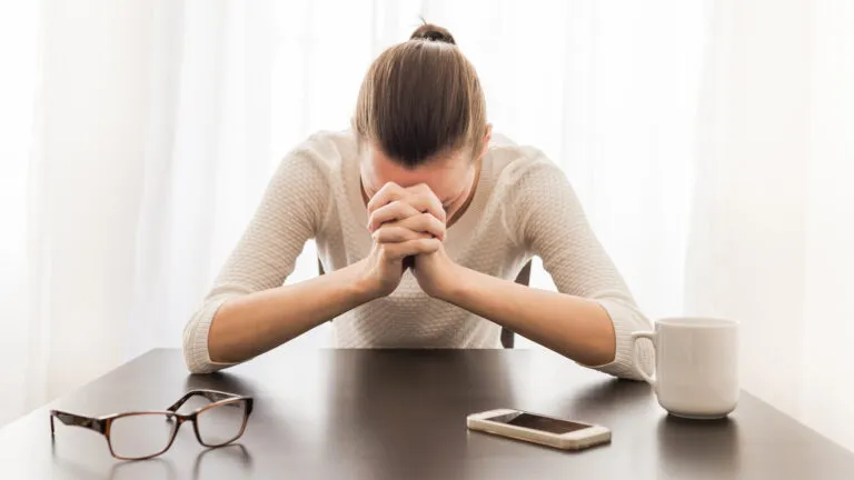 Praying at your desk.