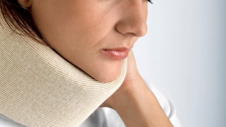 Woman in a neck cast.