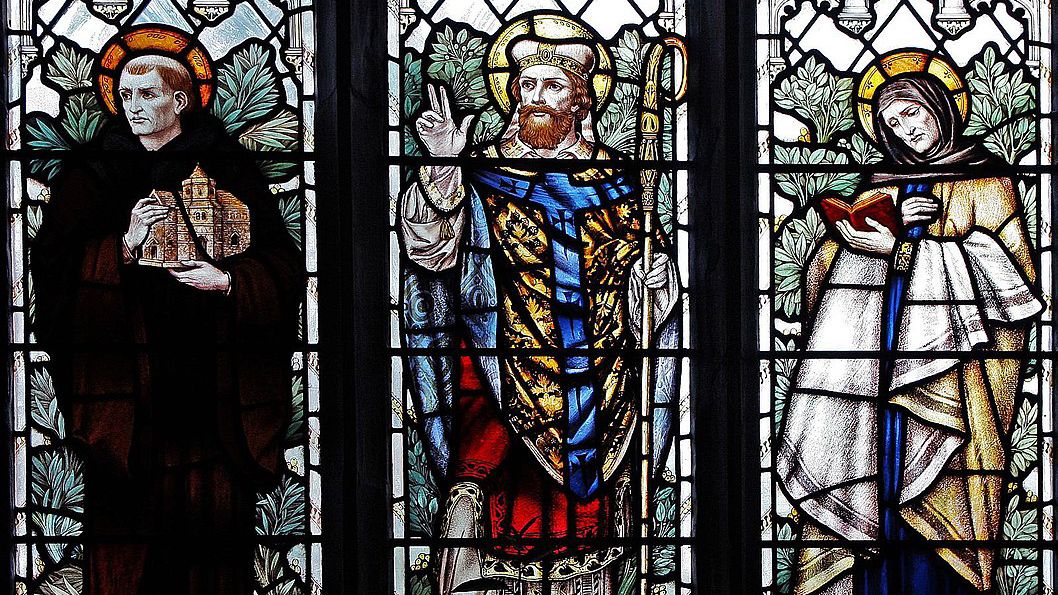 Julian of Norwich (far right) depicted in a stain glass window