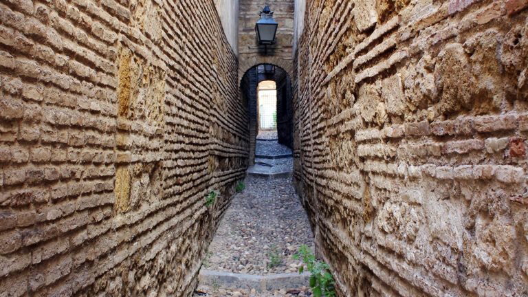 A path leads to a narrow gate
