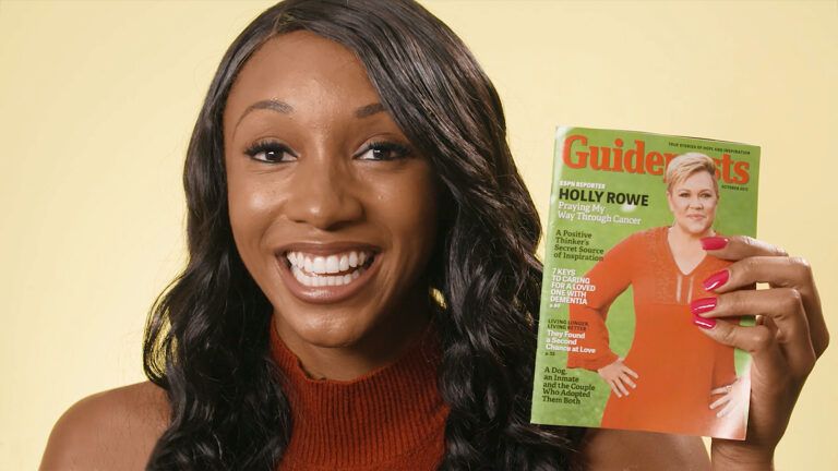 ESPN's Maria Taylor holds up a Guideposts magazine with Holly Rowe on the cover