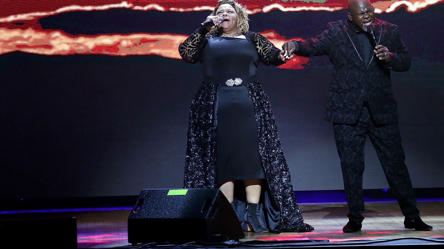 David and Tamela perform during their "Us Against The World' tour.