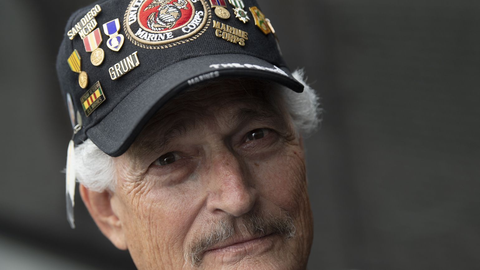 A close-up shot of Eddie at the Vietnam Veterans Memorial