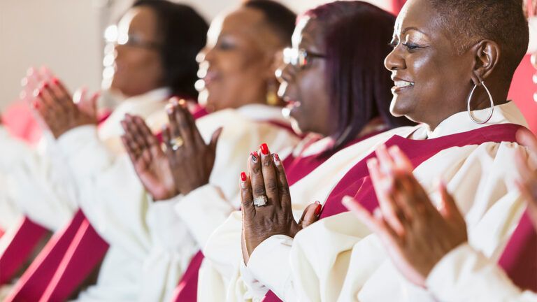 A church choir sings joyfully