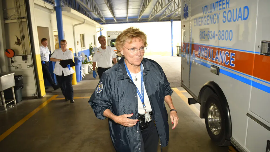 Assistant Chief – Communications, Marilyn Navarro on her way to answer an emergency call with her team. Navarro is an EMR and ambulance driver.