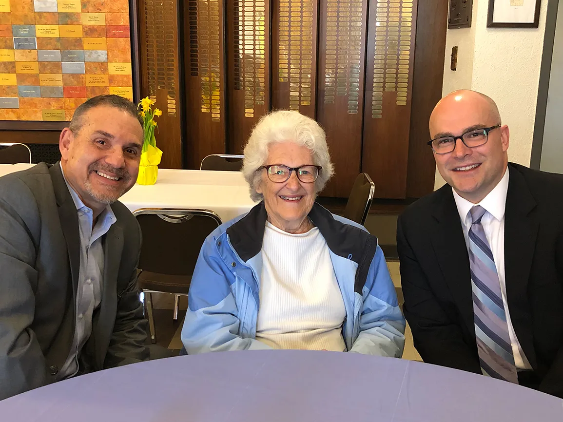 Pablo Diaz and Guideposts President and CEO John Temple spend some time with one of the event's attendees.