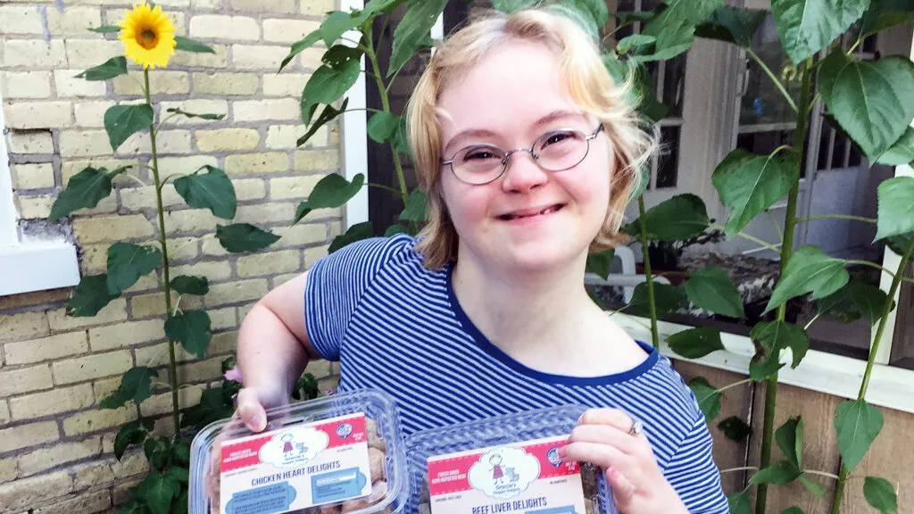 Gracie Jagler poses with some of her Doggie Delights