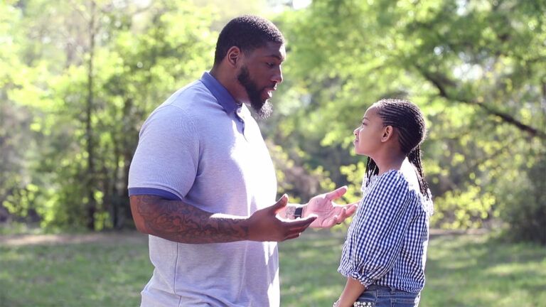 Former NFL player Devon Still and his daughter Leah
