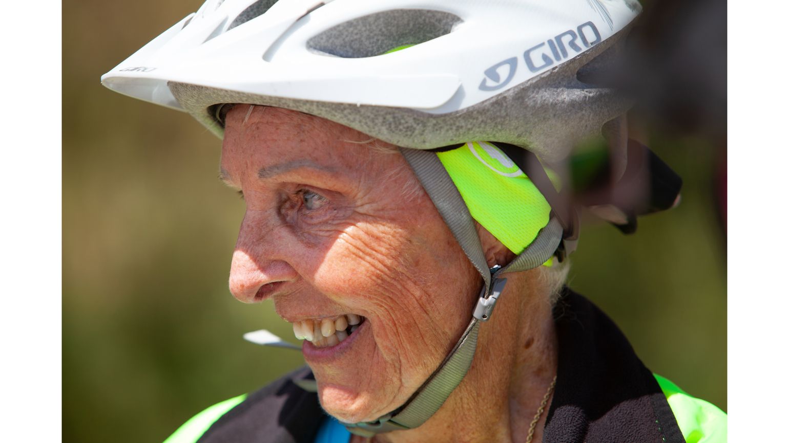 Water break from cross country biking trip, Carol Garsee, Cancer Survivor  better living health wellness living longer living better
