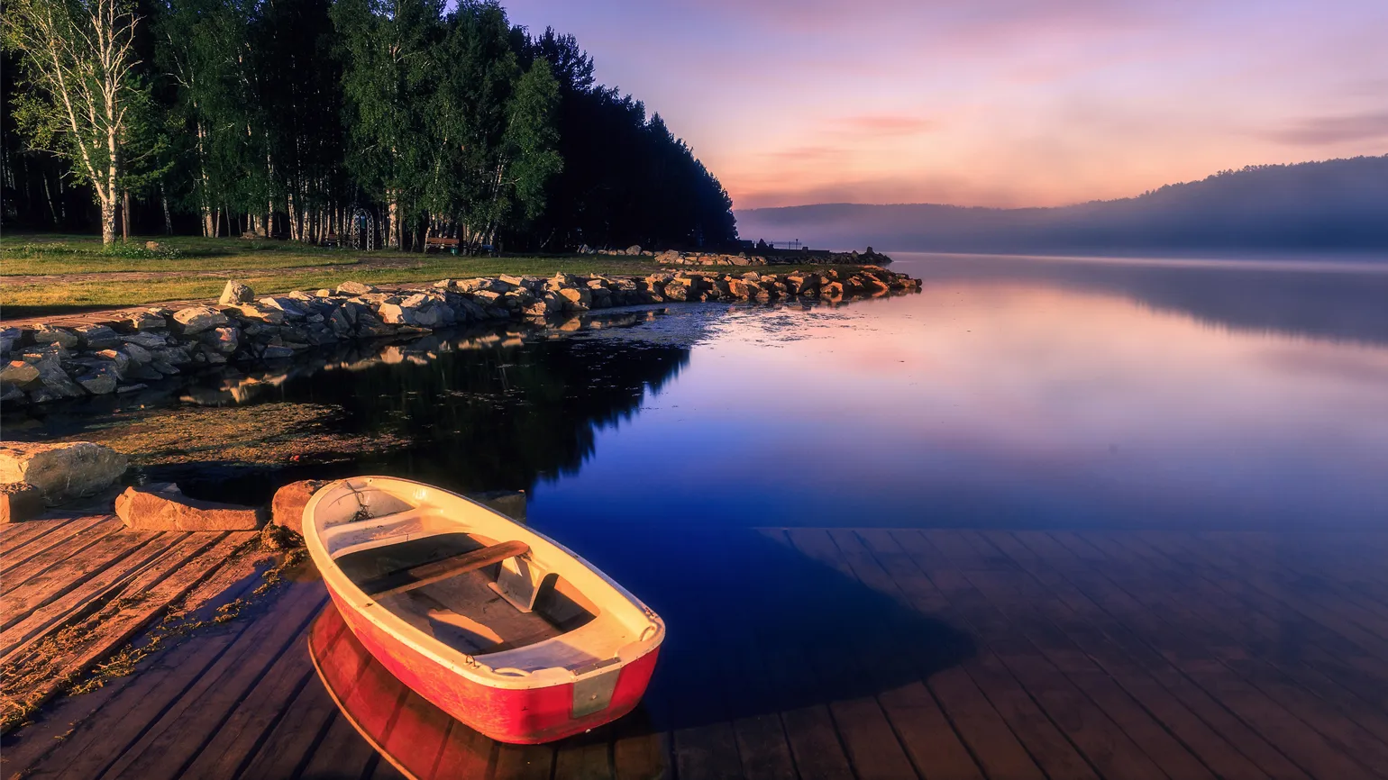 A pink and lavender sunrise on the lake. Mysterious Ways Editors Share what makes them feel awe inspiration miracles gods grace