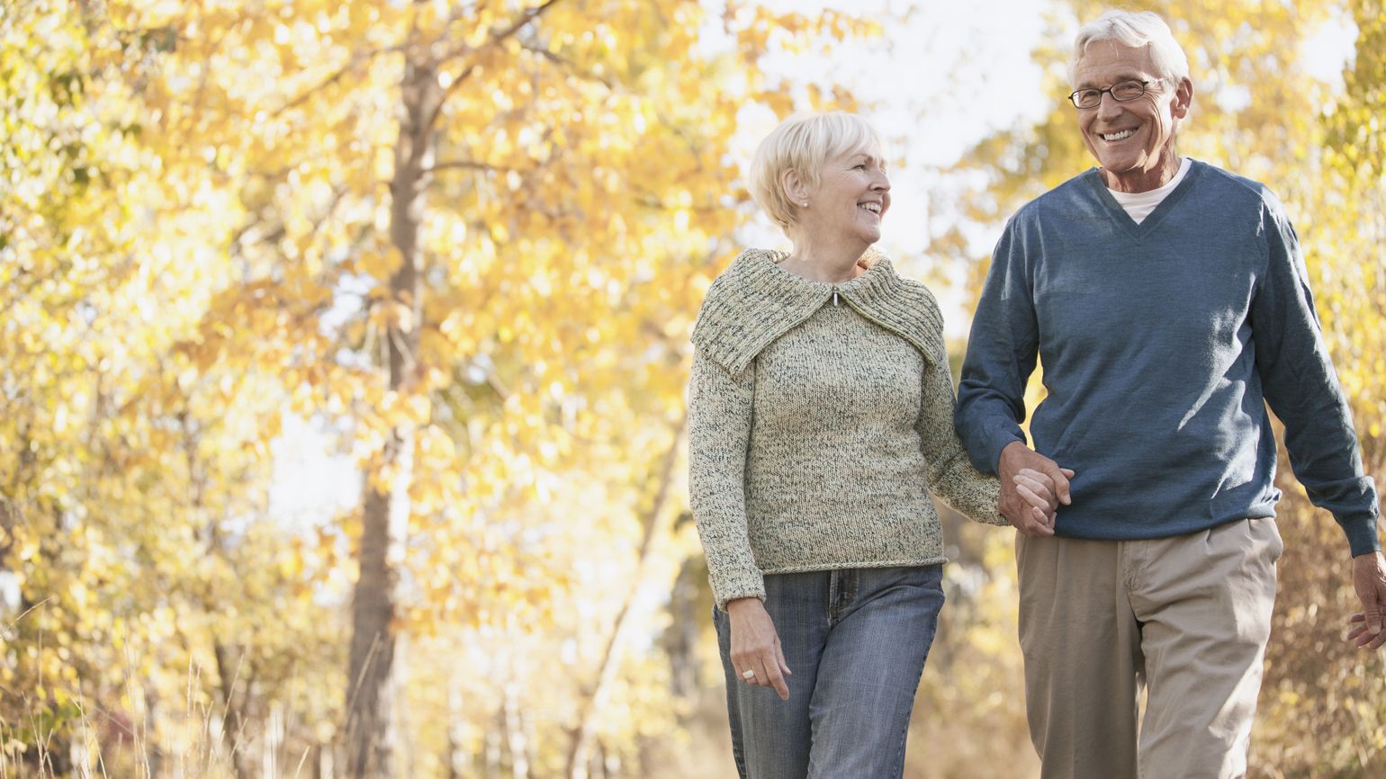 The Power of Love: An elderly couple holding hands during the Autumn season. Mysterious Ways Editors Share what makes them feel awe inspiration miracles gods grace