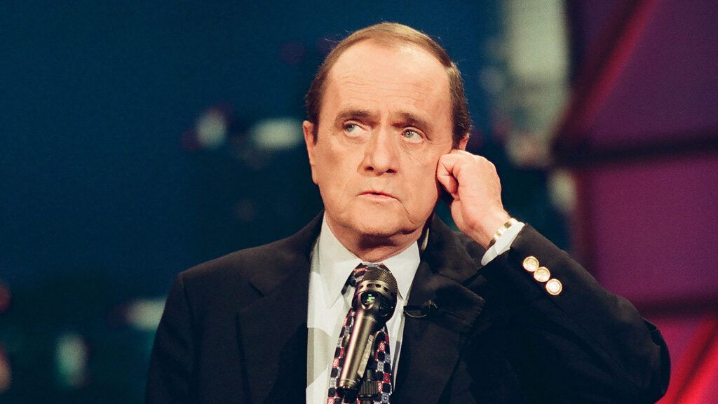 Comedian Bob Newhart performs one of his famous phone-conversation comedy routines