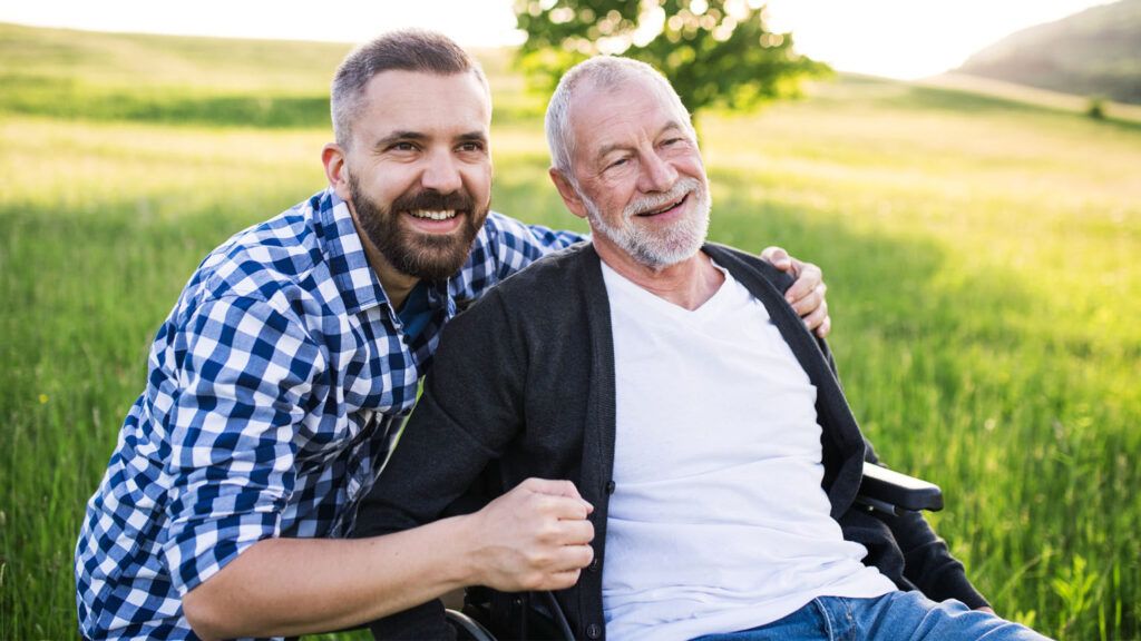 A male caregiver with his father.