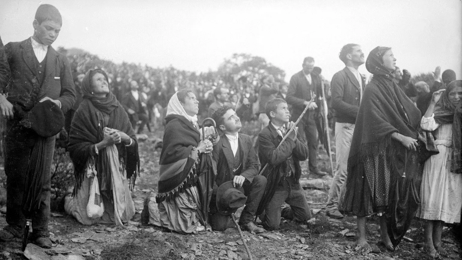 Thousands of onlookers wait for the promised miracle in the sky at Cova da Iria in Portugal.