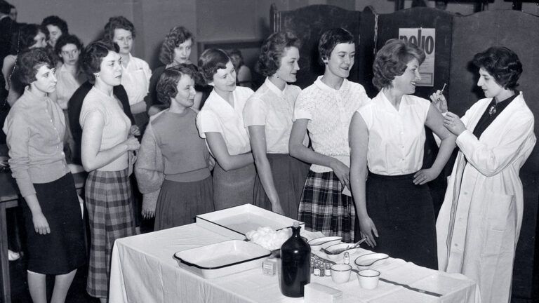 1950s teens line up for the polio vaccine