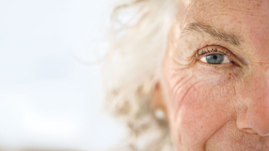 A close up of an aging woman's left eye.