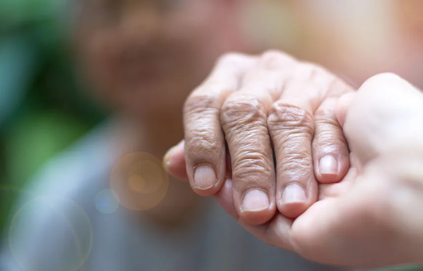 Two hands touching each other