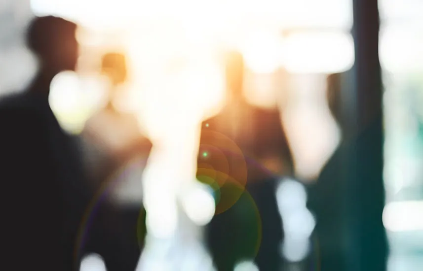 De-focused shot of a group of people