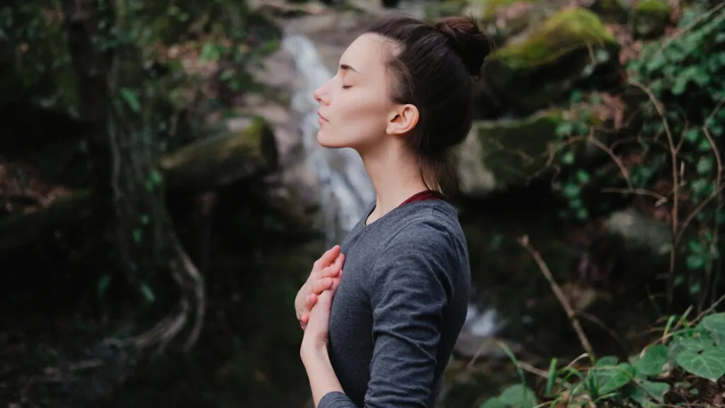 A woman listening.