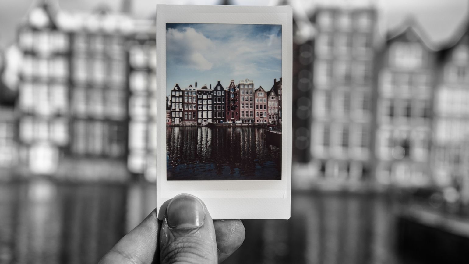 Polaroid photo of buildings.