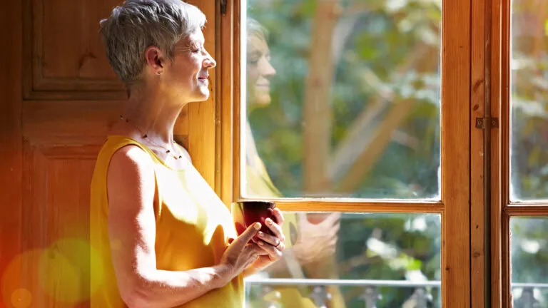 An older woman reflecting.