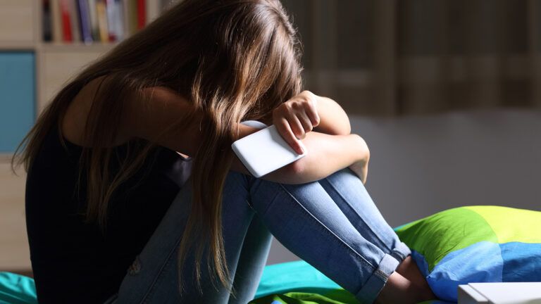 A distressed woman prays