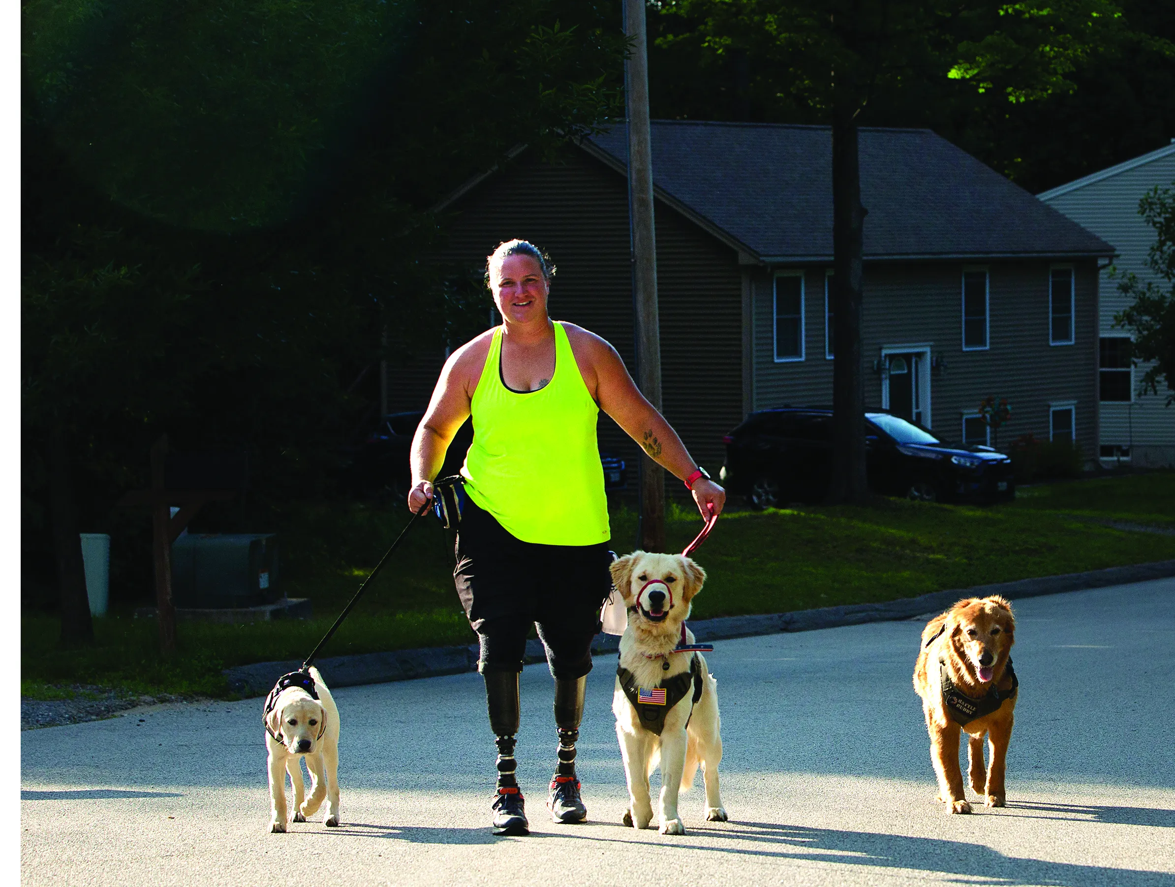 Christy with service dogs Gidget, Douglas and Moxie.