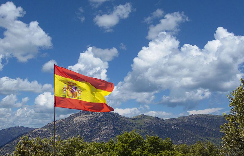 Spanish flag in a mountain background