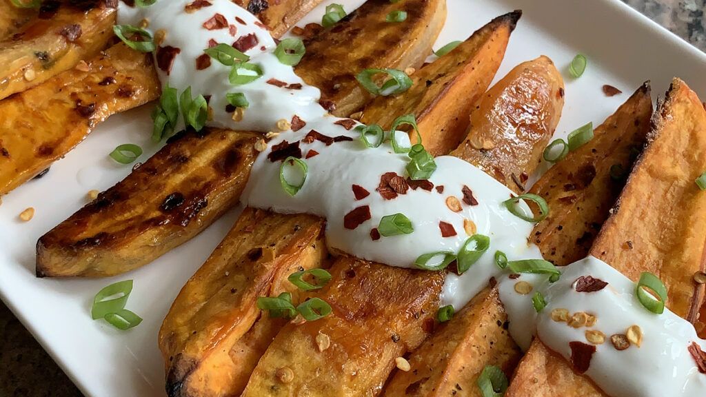 Sam Sifton's Honey-Roasted Sweet Potatoes With Yogurt Sauce; photo by Kevin Eans