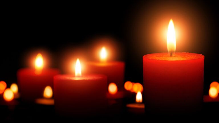 Four lit Advent candles