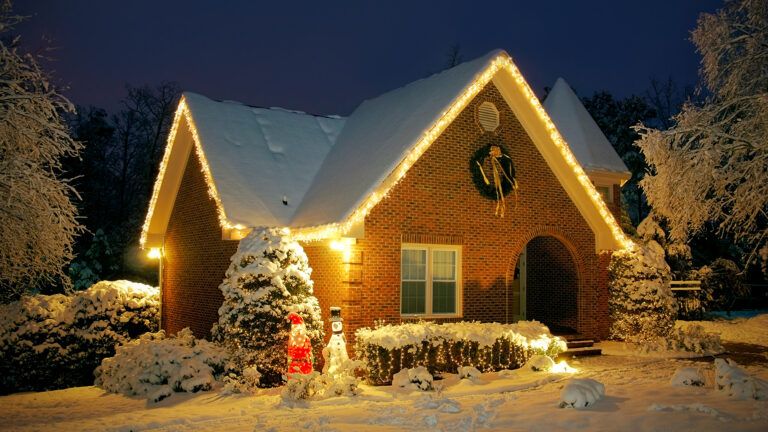 A modest home with Christmas lights