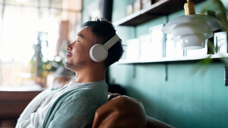 Man with his eyes closed listening to a podcast about how to do lent