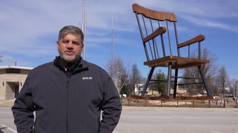 Jim Bolin in front of the World's Largest Rocking Chair in Casey, Illinois