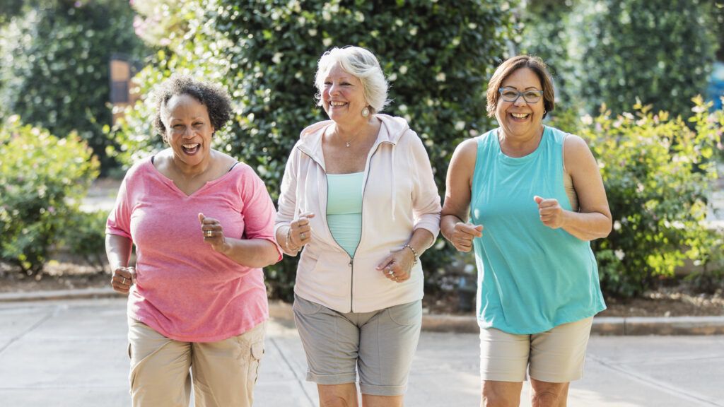 Senior women exercising together (Getty Images)
