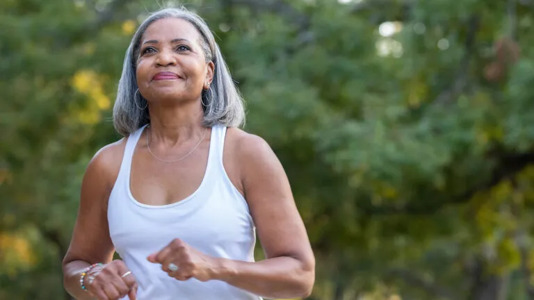 Woman in her golden years enjoying a walk; Getty Images